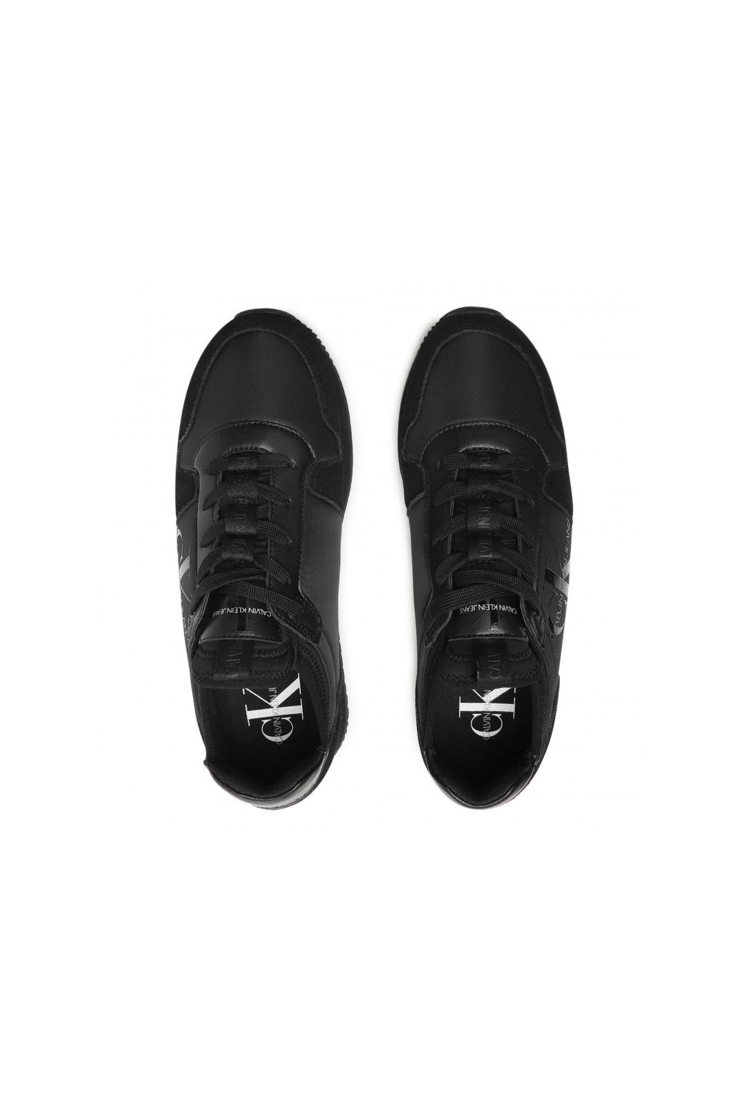Chaussure mixte sneakers Calvin Klein de couleur noir en daim et simili cuir. YM0YM00040 FIESTA CONCEPT STORE